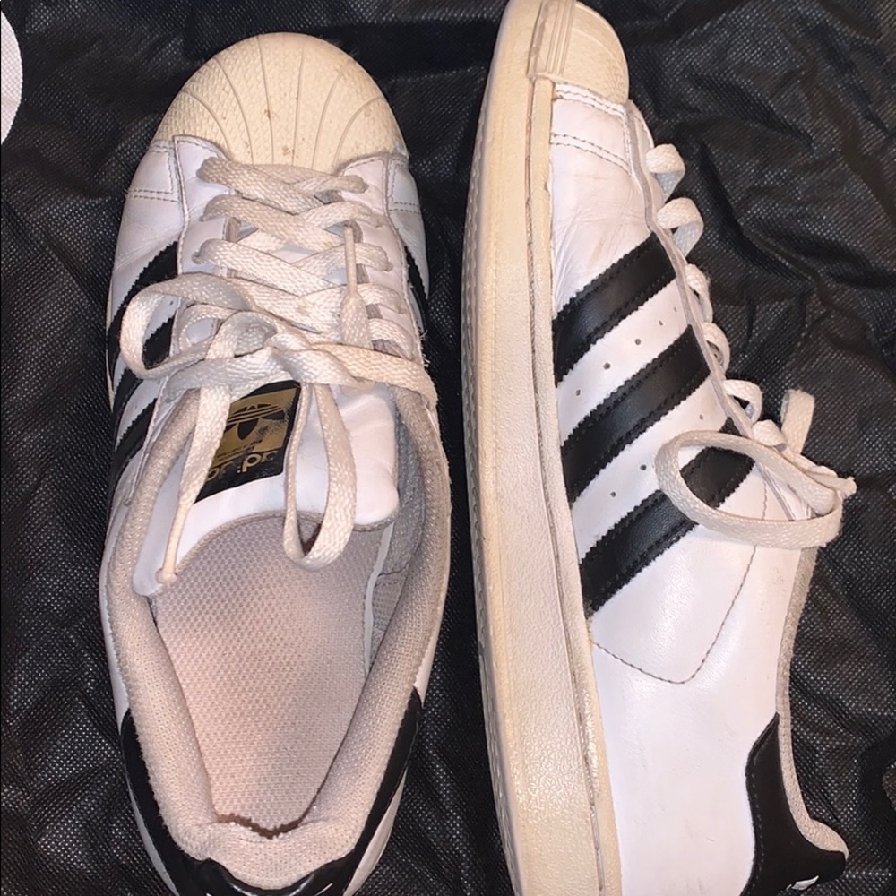 black and white adidas superstars